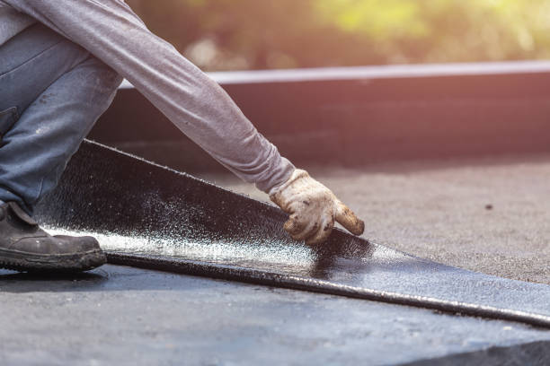 Professional Basement Waterproofing technician working in Lexington, KY